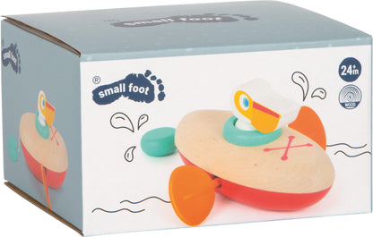 Wasserspielzeug Aufzieh-Kanu Pelikan ab 24 Monate, small foot®